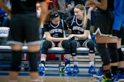 Paige Bueckers gave her Hopkins teammate Amaya Battle a high-five at the Lindbergh Center on Feb. 29, 2020, in Minnetonka, Minn. The two will meet on 