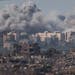 Smoke rises from the site of an Israeli airstrike in the Gaza Strip, seen from southern Israel on Nov. 21.
