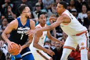 Timberwolves forward Kyle Anderson was defended by Spurs rookie Victor Wembanyama in Minnesota’s 117-110 victory in the team’s first game in the N