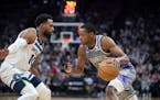 Timberwolves guard Mike Conley defended against high-scoring Kings guard De’Aaron Fox in Sacramento last March. Fox is averaging 29.2 points this se