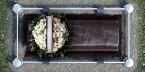 The national median cost of a funeral with burial has risen to $8,300 this year, according to the National Funeral Directors Association.