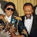 Michael Jackson and Quincy Jones celebrated their big haul at the 1984 Grammys.