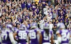 Fans cheer during the second half when the Vikings played the Saints at U.S. Bank Stadium earlier this month.