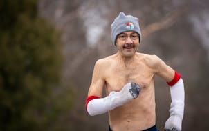 Steve DeBoer ran near his home in Rochester, Minn., on Tuesday, Nov. 21, 2023. DeBoer has run at least a mile a day every day for more than 52 years. 