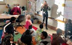 Emily Patzer began a lesson with her fifth-grade class at East African Magnet Elementary School in St. Paul. The school opened in September, just mont