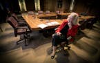 Janice Rettman worked alone in the council chambers before the Ramsey County board meeting, Tuesday, August 15, 2017 in St. Paul, MN. ] ELIZABETH FLOR