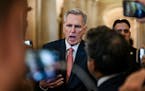 Rep. Kevin McCarthy (R-Calif.) speaks to reporters about a run-in he had with Rep. Tim Burchett (R-Tenn.), one of the eight Republicans who had voted 