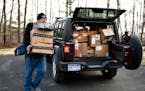 Mail carrier Dennis Nelson delivered Amazon packages to a home in remote northern Minnesota on Saturday.
