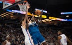 Thunder forward Chet Holmgren (7) defended Anthony Edwards (5) as the Timberwolves guard took a shot in the second quarter Tuesday at Target Center. E