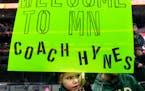 A young fan holds up a sign welcoming new Minnesota Wild head coach John Hynes Tuesday, November 28, 2023, at Xcel Energy Center in St. Paul, Minn. ] 