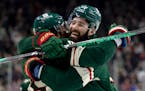 Frederick Gaudreau and Pat Maroon of the Wild celebrated Gaudreau’s goal Tuesday against St. Louis at Xcel Energy Center.