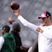 Jets quarterback Aaron Rodgers, shown throwing before a game against the Eagles on Nov. 15, has been cleared to practice — exactly 11 weeks after ha