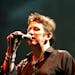 FILE - Shane McGowan performs live on stage at the Fleadh 2002 Music festival, Finsbury Park, North London, June 8, 2002. Macgowan, the singer-songwri