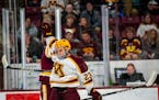The puck bounced off Gophers freshman Jimmy Clark’s helmet during the Nov. 3 victory against Minnesota Duluth in Minneapolis.