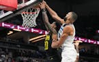 Timberwolves center Rudy Gobert blocked a shot by Jazz forward John Collins in the first half of Minnesota’s 101-90 victory at Target Center on Thur