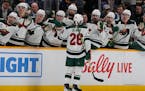 Connor Dewar celebrated one of his three goals — one in each period — with the Wild bench in a 6-1 crushing of the Predators in Nashville on Thurs
