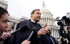 Rep. George Santos (R-NY) is surrounded by journalists as he leaves the U.S. Capitol after his fellow members of Congress voted to expel him from the 