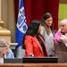 Minneapolis City Council Members Aurin Chowdhury, center, and Lisa Goodman talked as Linea Palmisano listened while Budget Committee Chair Emily Koski