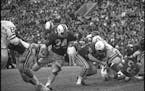 University of Minnesota James “Jim” Carter in action vs. Wisconsin on Nov. 25, 1967. The Gophers beat the Badgers 21-14 in this, the season’s fi