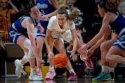 Gophers guard Mara Braun clamored over the ball during the second overtime against Drake on Saturday.