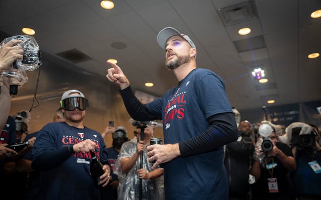 Twins manager Rocco Baldelli spoke to the team in the locker room after winning the American League Central title.