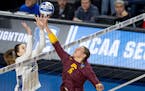 Minnesota’s Melani Shaffmaster tapped the ball over the net toward Creighton’s Norah Sis during the third set of Saturday's NCAA women’s volleyb