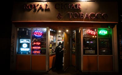 Royal Cigar & Tobacco customers walked into the Dinkytown store Sunday, hours after two people were shot and killed there, Minneapolis police said. 