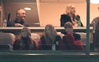 Taylor Swift, lower right, looked out on Lambeau Field during warmups before an NFL football game between the Kansas City Chiefs and Green Bay Packers