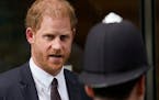 FILE - Prince Harry leaves the High Court after giving evidence in London, Tuesday, June 6, 2023. Prince Harry is challenging on Tuesday, Dec. 5, 2023