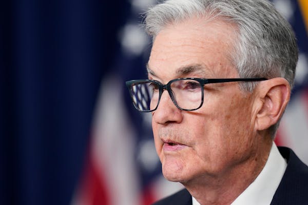 Federal Reserve keeps key interest rate unchanged, signals possible rate cut next year